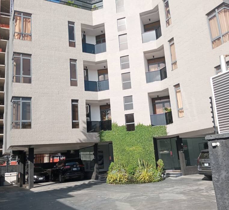 Gentry Court residential building and entrance courtyard, Ikoyi